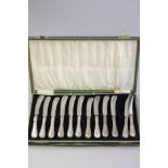 Cased Set of Twelve Silver Handled Butter Knives (one a/f)