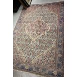 Eastern Pink Ground Rug with stylised trees and foliage design