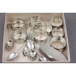 Silver Lidded Dressing Jar, Eight Silver Napkin Rings and a Set of Six Silver Teaspoons