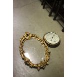 Early 20th century Oak Cased Circular Barometer and an Ornate Gilt Framed Mirror