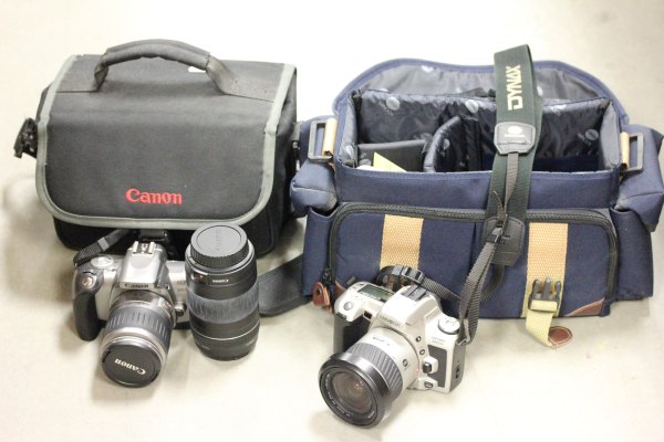 Minolta SLR Camera Dynax 505 SI with extra lens in Carry Case together with a Canon SLR Camera EOS