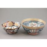 Chinese Blue Ground Bowl with panels of figures and birds together with a Japanese Imari Bowl with