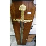 Double Handled Replica Sword on Oak Plinth with plaque that reads 'L Epee De Charlmagne'