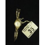 Ladies Vertex Cocktail watch c1950's on elasticated gold coloured strap also marked Vertex case