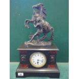 Marble mantle clock, late 19c with an enamel dial, Roman Numerals, the top section with a Marley