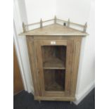 Small pine corner cabinet, freestanding, 3' tall glass doors to the front with a single shelf