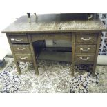 Oak 1920's pedestal Bankers desk a cluster of 3 raised drawers to the side, single long drawer