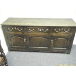 C1750's George 11 oak low dresser base with triple planked top above 3 drawers, and twin