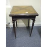 19c figured walnut envelope card table of small proportions on delicate tapering supports,