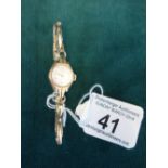 Delicate 9ct gold Vertex Ladies Cocktail watch, on gold coloured elasticated strap, 1959 inscription