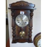 8 day wall clock striking on a gong with drop pendulum, c1950's