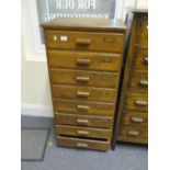 Oak office chest, flight of 8 drawers, 4' tall