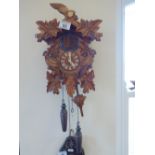 Decorative Cuckoo clock, made in Germany with Black forest style design