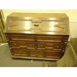 Edwardian period Arts & Crafts design dresser of small proportions with carved decoration of Dragons