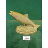 Bronzed model of a Fish in swimming mode, 4" tall on an oval base