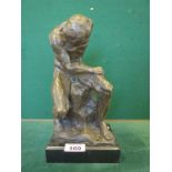 BC Zheng a bronze figurine of a seated naked man, 11" tall, signed to reverse