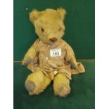 Collectable antique Teddy Bear by Unity in a played condition, Paws are in good condition, 1 leg has