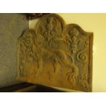 Antique style fire back with picture of Regency lion and Thistles,