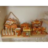 Cottage ware by Price comprising biscuit barrel and lid, butter dish and lid, cruet set, tea pot,