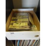 Amount of cigarette cards, amount of postcards and a bible