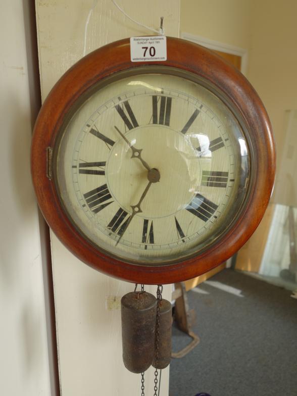 19c Post wall clock with drop weights and pendulum striking on a bell