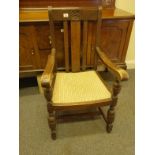 Early 20th century open oak carver chair, Gentleman's size, with drop in seats