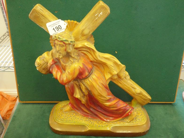 Hand painted chalk figure of Jesus carrying the Cross, signed Arnoba and No:239