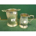 Silver plated wine bottle holder, Edwardian, and a similar period Edwardian tankard,