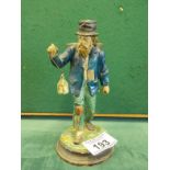 Small Spelter figure of a Fisherman holding a lantern, 6.1/4" tall with back sack probably a match