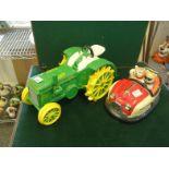 Novelty cookie jar and lid modelled as a Dodgem Car with figures and 1 other Novelty cookie jar