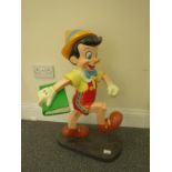 Vintage Store display model, Composite figure of Pinocchio in running stance holding a book, Walt