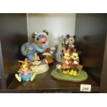 Collection of Walt Disney figurines various makers and designs including Puppy Love, Mickey and