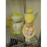 Cookie jars and lids, a rare model of Disney Tinkerbelle in a seated position, and 1 other