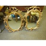 2 similar decorative gilt framed antique style mirrors, both oval,