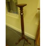 4' tall Victorian style Torchere on tripod hairy paw and ball supports, with a fluted centre column,