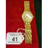 Superb 18ct gold and diamond bezel Cartier Unisex watch, circular dial measuring 1" dia, with