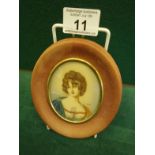 20th century oval miniature of a young Lady, set in velvet style brown frame, image size 3.5" x 2.5"