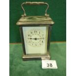 Early 20th century carriage clock with an 8 day movement, enamel painted dial 4.1/4" tall silver