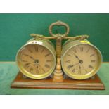 Tournament twin Chess clock, on oak stand, twin timed clocks to each side with Roman Numerals and