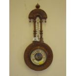 Edwardian period Banjo barometer probably aneroid with temperature aperture and weather aperture,