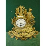 Decorative figural clock with gilt decoration the centre section with an 8 day French timepiece No: