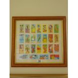 Walt Disney a framed collection of cigarette card size coloured cards, the Magical World of Disney