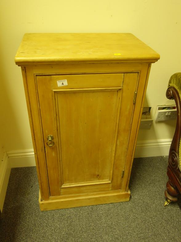 Pine 19c cupboard with a single door to the front, 36" tall 14" deep on a plinth base