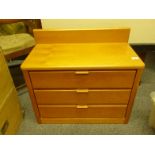 Small Scandinavian solid wood bedside cupboard with a cluster of 3 short drawers, by Hulsta 18" tall