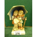 Hummel, a early model of Stormy Weather No: 71, 2 children standing under an umbrella, 6.5" tall