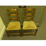 Pair of rush seated ladder back chairs,