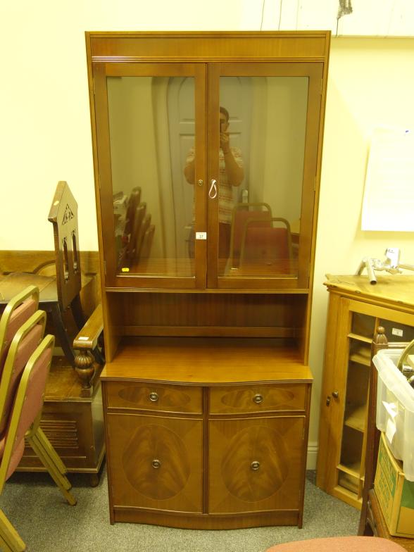 Regency style show cabinet 6'6 tall with twin glazed doors to the top, all above a section of