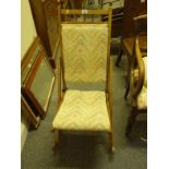 Delicate walnut metamorphic rocking chair with modern upholstery, probably used and a Ladies deck