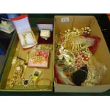 Box containing a large amount of various costume jewellery including bangles, necklaces, brooches