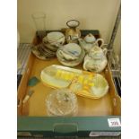 Box containing collector’s items including tea set,